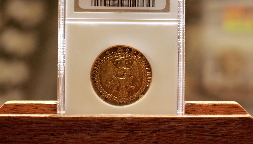 Photo Credit: Stephen Chernin/Getty Images News/Getty Images The Brasher Doubloon, the first gold coin minted in the United States