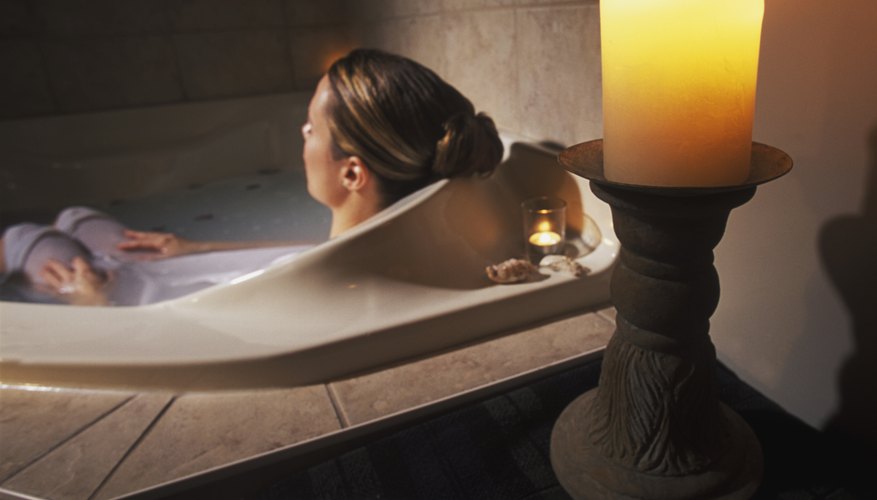 Photo Credit: Design Pics/Design Pics/Getty Images Woman resting in tub