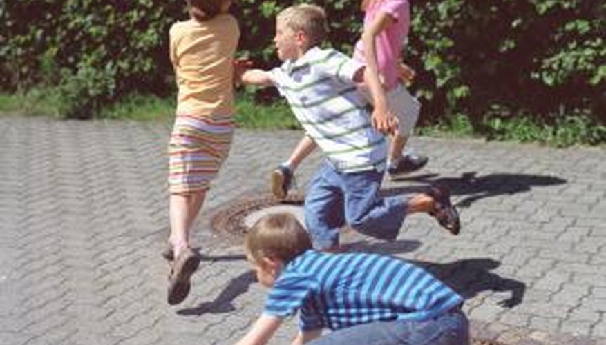 Modern children play tag, a game hundreds of years old. Modern children play tag, a game hundreds of years old.