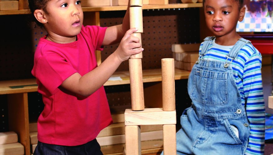 Build tall towers to encourage your tots to work together. Build tall towers to encourage your tots to work together.