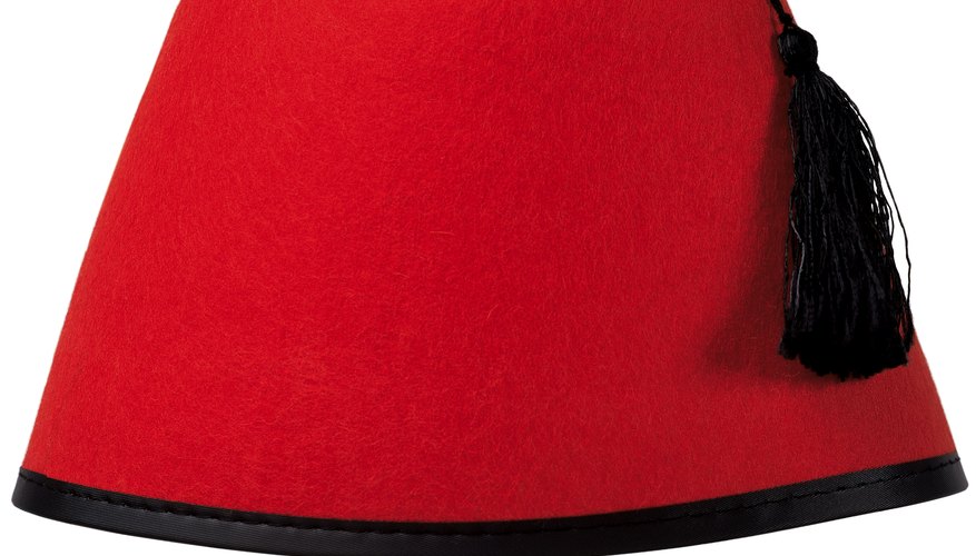Make a miniature fez for your pet, child or doll. Make a miniature fez for your pet, child or doll.