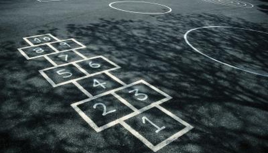 Early 20th century kids played hopscotch. Early 20th century kids played hopscotch.