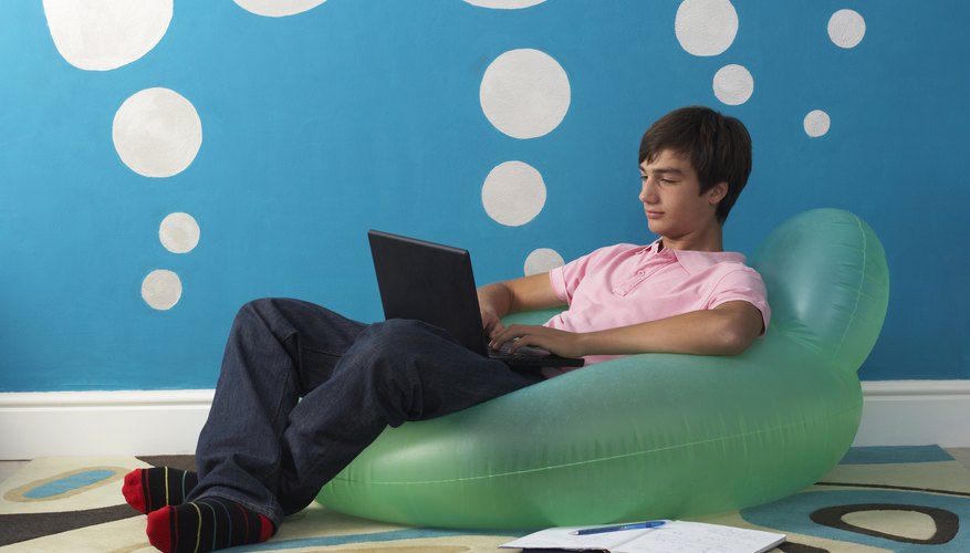 Many teens spend long hours on the computer each day. Many teens spend long hours on the computer each day.