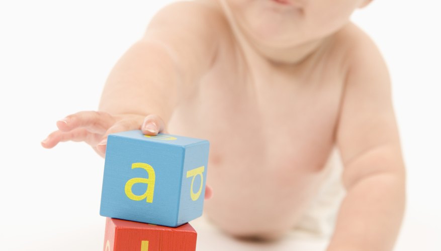 Simple stacking play helps encourage motor skills, constructive play and persistence. Simple stacking play helps encourage motor skills, constructive play and persistence.