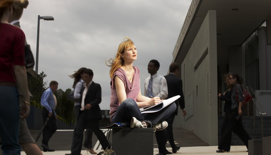 Photo Credit: Toby Burrows/Digital Vision/Getty Images Artist sketching people.