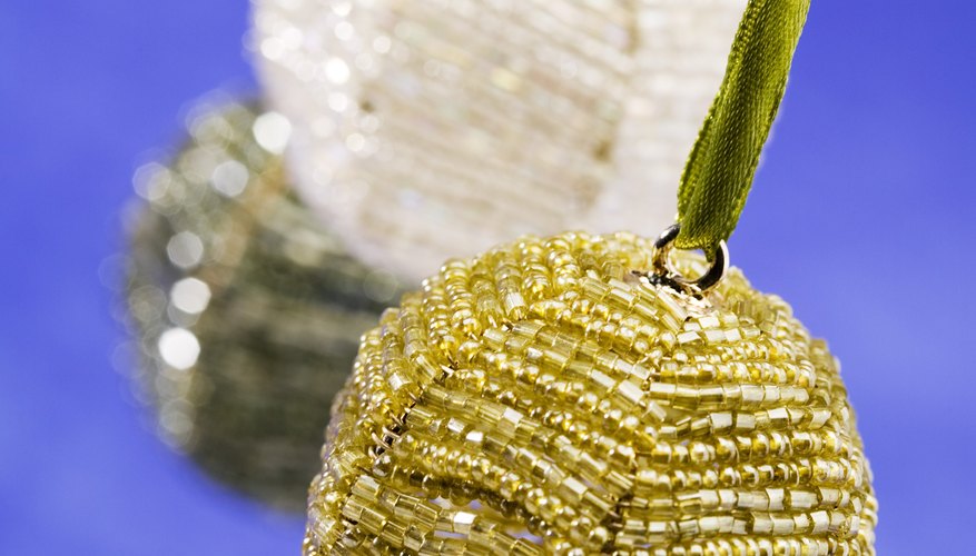 Beaded ornaments are easy to create in bell or ball shapes Beaded ornaments are easy to create in bell or ball shapes
