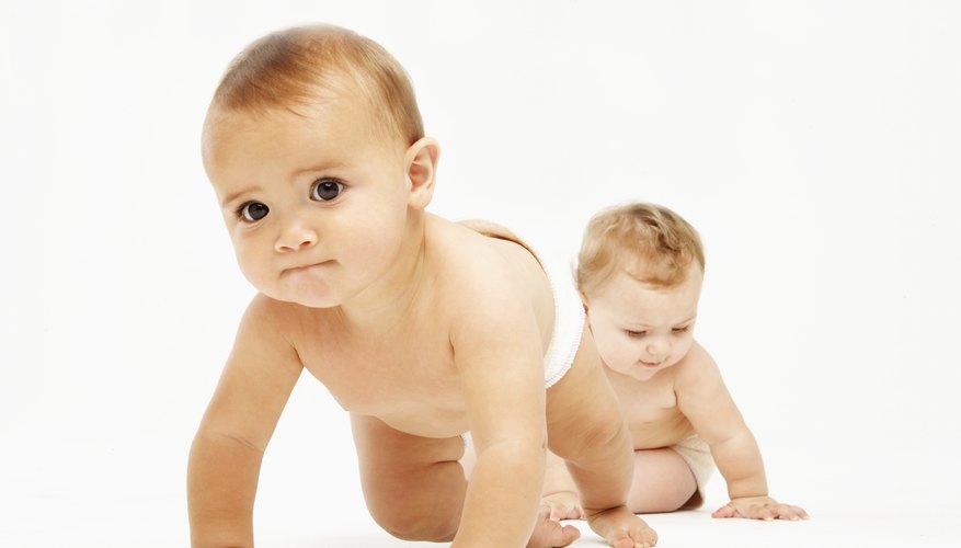 Babies can use thousands of diapers in their first year -- a diaper bear makes a fun and practical gift. Babies can use thousands of diapers in their first year -- a diaper bear makes a fun and practical gift.