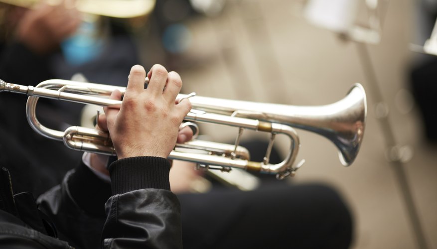 Photo Credit: Kuzma/iStock/Getty Images Man playing trumpet
