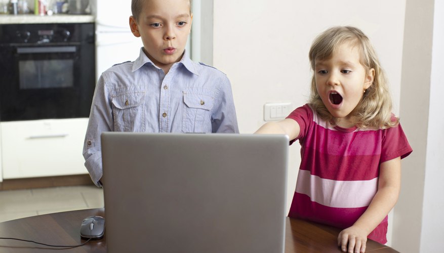 Children watching video on internet Children watching video on internet