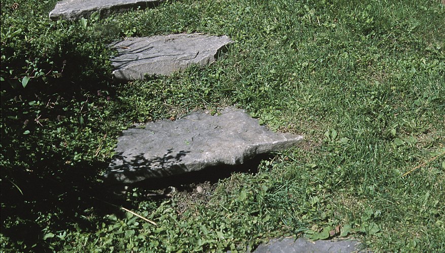 A path of stepping stones makes it easier to walk over uneven ground. A path of stepping stones makes it easier to walk over uneven ground.