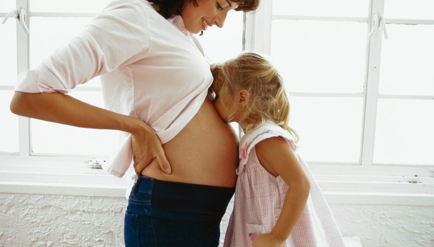 pregnant woman with daughter pregnant woman with daughter