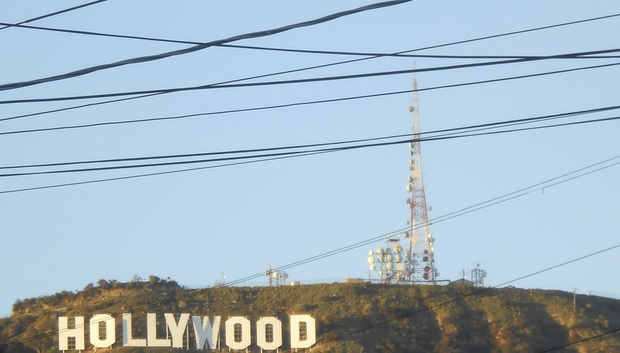 The Hollywood sign on the side of a hill. The Hollywood sign on the side of a hill.
