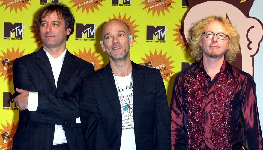 Peter Buck and his band mates. Peter Buck and his band mates.