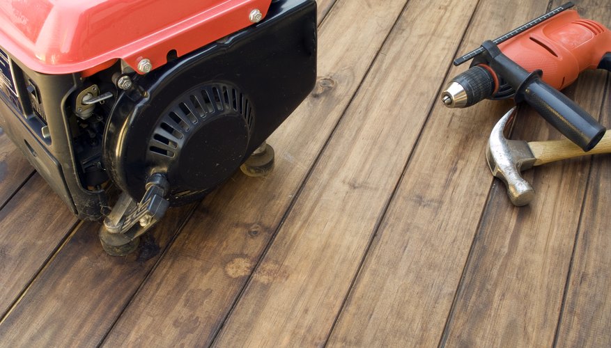 Photo Credit: Alistair Cotton/Hemera/Getty Images Lawnmower engines can be converted into a generator.