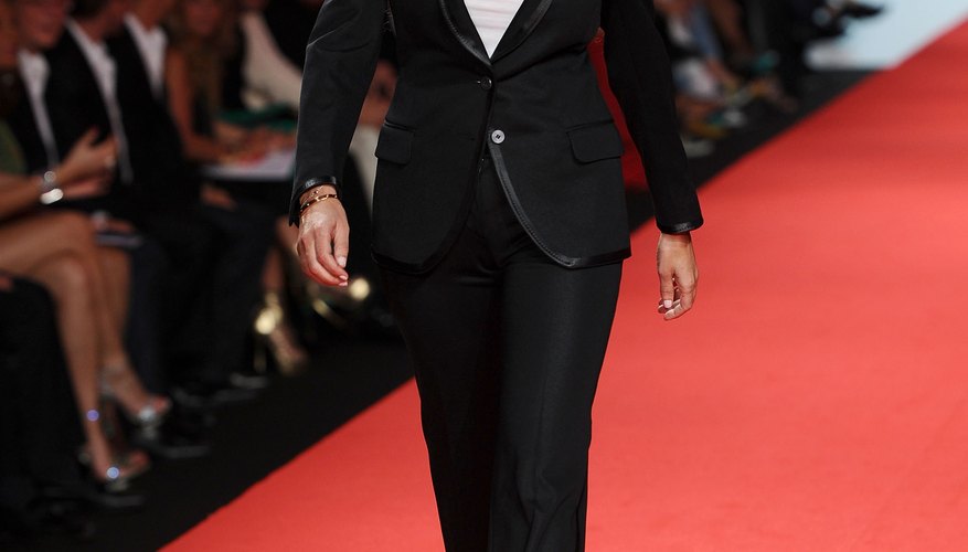 The shawl collar is an extension of the lapel. The shawl collar is an extension of the lapel.