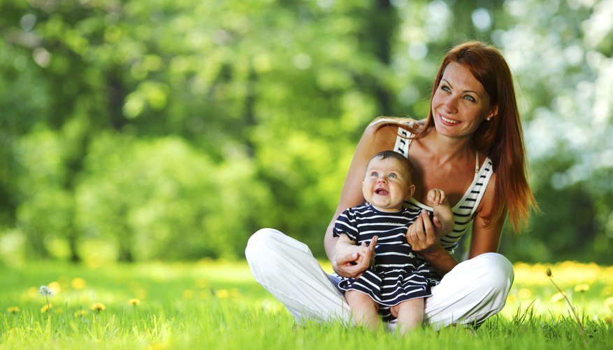 Mother and young child at park Mother and young child at park