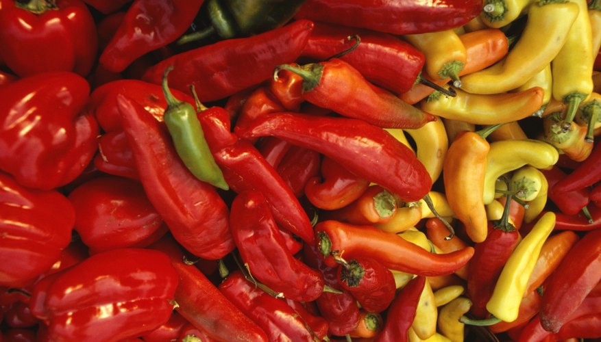 Hot peppers come in a variety of colors, shapes and sizes. Hot peppers come in a variety of colors, shapes and sizes.