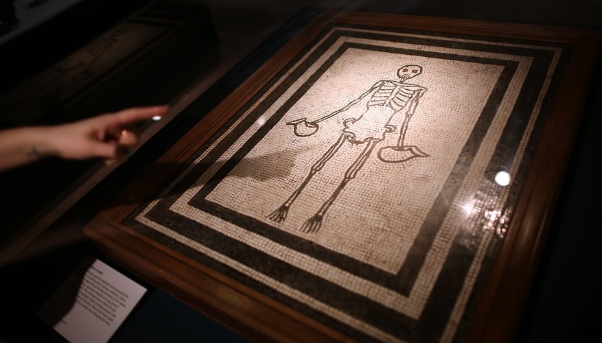 Roman mosaic of a skeleton on display in London museum Roman mosaic of a skeleton on display in London museum