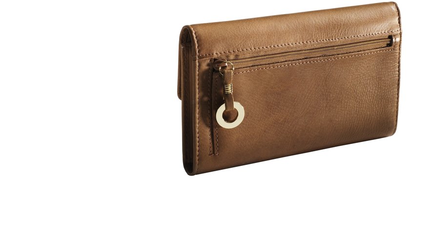 An accordion style wallet collapses into the same size as a normal wallet. An accordion style wallet collapses into the same size as a normal wallet.