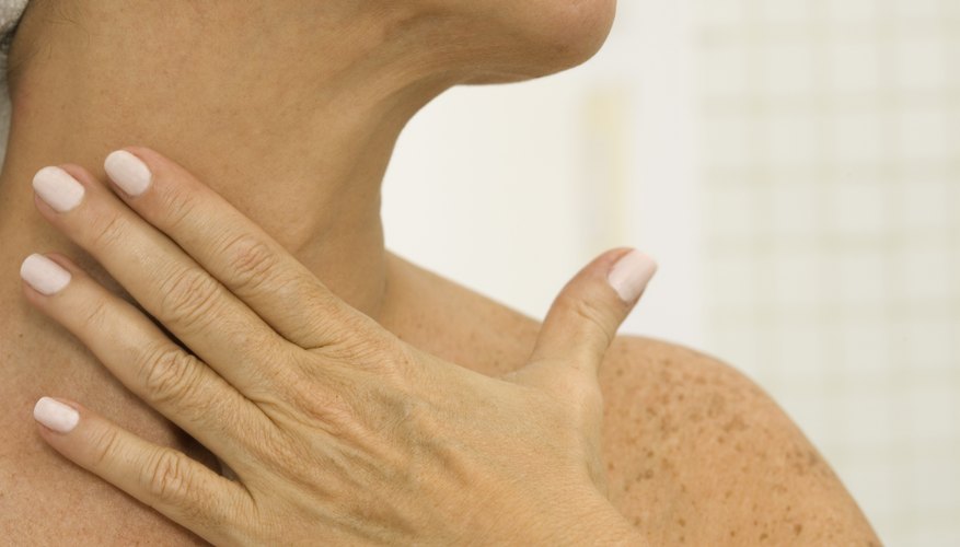 A close up of a woman's neck. A close up of a woman's neck.