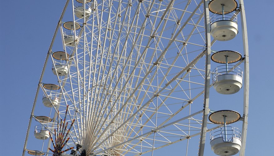 The spokes of a Ferris wheel have a length equal to the wheel's radius. The spokes of a Ferris wheel have a length equal to the wheel's radius.