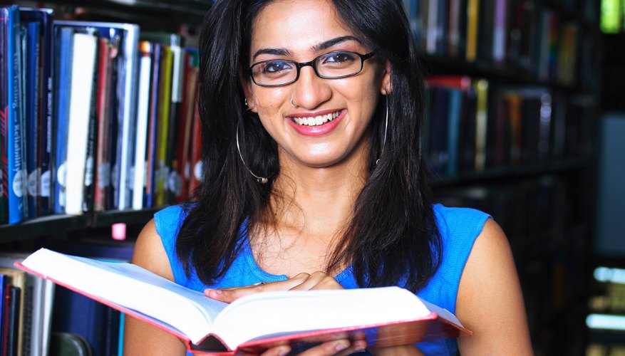 Photo Credit: Visage/Stockbyte/Getty Images woman at library