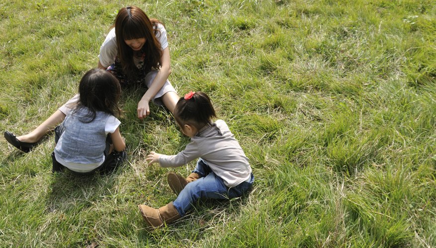 Group of children playing on grass. Group of children playing on grass.