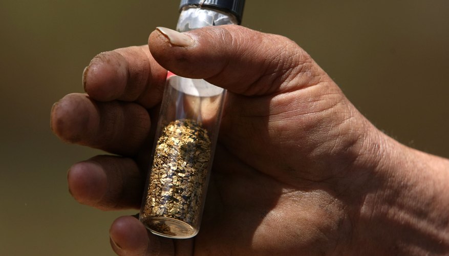 Prospector hobbyists often keep gold flakes in clear glass jars. Prospector hobbyists often keep gold flakes in clear glass jars.