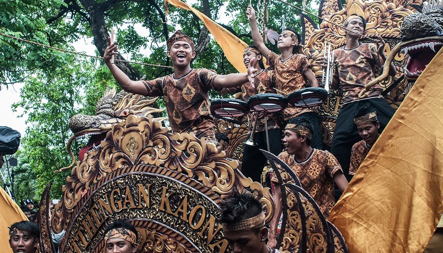 Men playing traditional Balinese music during festival Men playing traditional Balinese music during festival