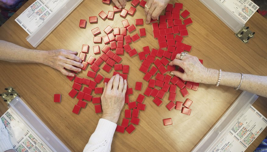 people picking tiles for Mahjong people picking tiles for Mahjong