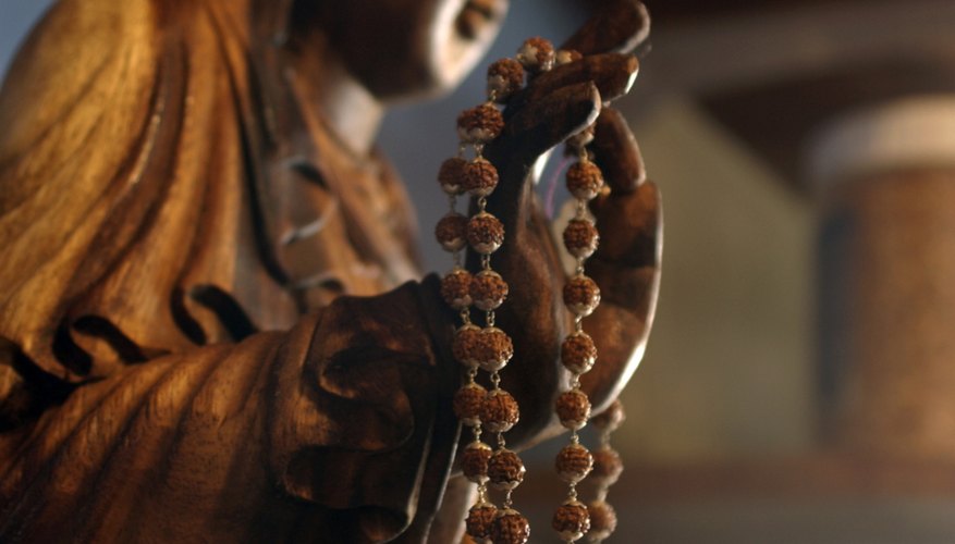 Prayer bead bracelets can add flair to an otherwise dull outfit. Prayer bead bracelets can add flair to an otherwise dull outfit.
