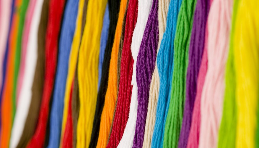 Use colorful yarn for hair. Use colorful yarn for hair.