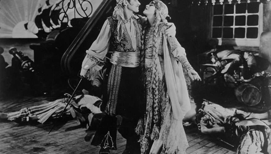 A romantic scene between a pirate and a damsel, circa 1918 A romantic scene between a pirate and a damsel, circa 1918