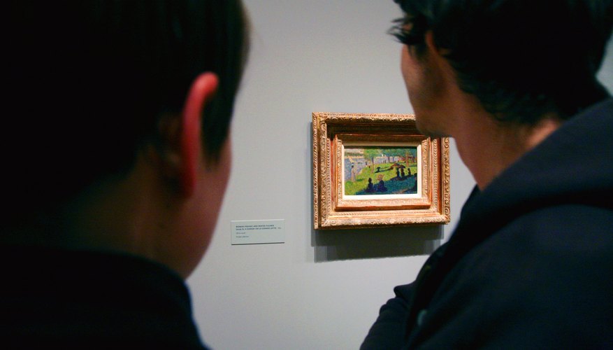 Men looking at Georges Seurat painting in muesum Men looking at Georges Seurat painting in muesum