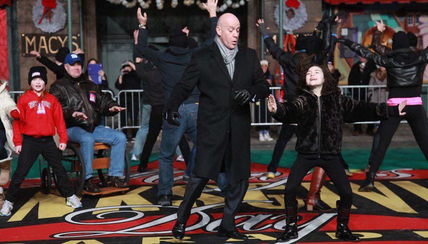 Anthony Warlow as Daddy Warbucks dances with the cast of Anthony Warlow as Daddy Warbucks dances with the cast of