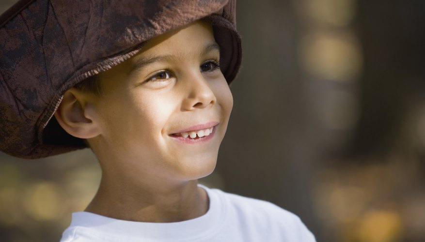 Close-up of child wearing pirate hat. Close-up of child wearing pirate hat.