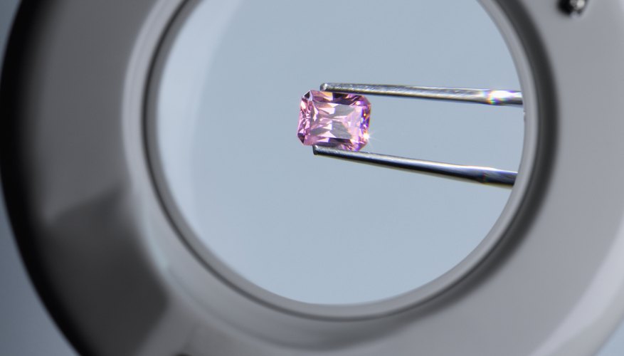 Real gemstones have many traits synthetic stones do not possess. Real gemstones have many traits synthetic stones do not possess.