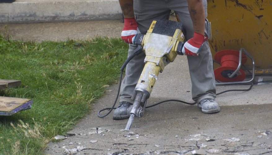 Loud, rapid impacts of metal on stone make the percussive noise of a jackhammer. Loud, rapid impacts of metal on stone make the percussive noise of a jackhammer.