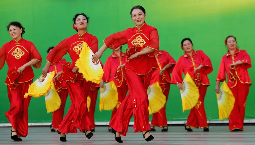 Photo Credit: Guang Niu/Getty Images News/Getty Images Dancing with fans in China