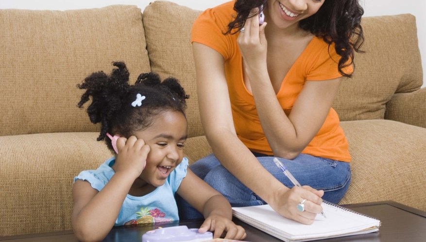 Play pretend on the phone with your child to help develop phone skills. Play pretend on the phone with your child to help develop phone skills.