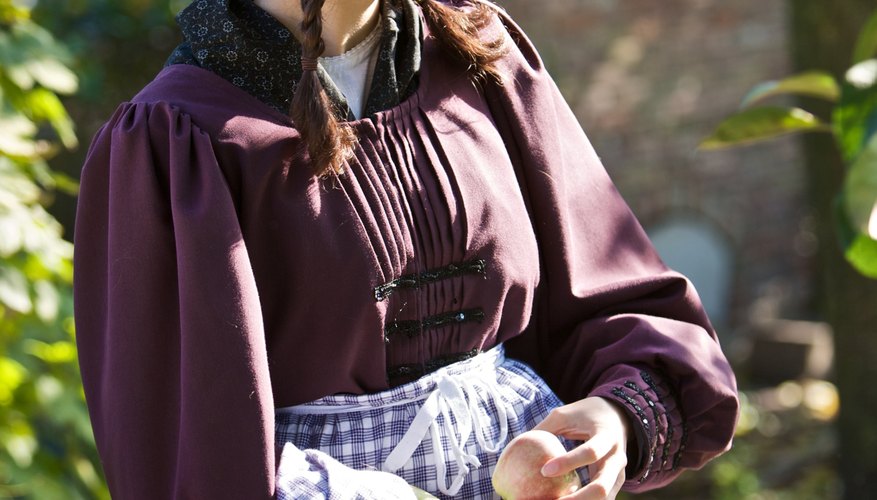 Peasants wore long aprons to keep their skirts clean. Peasants wore long aprons to keep their skirts clean.