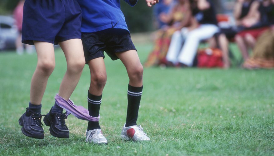Players with similar heights may find a three-legged race easier. Players with similar heights may find a three-legged race easier.