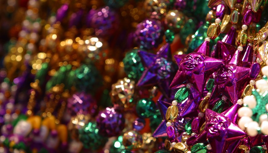 Have plenty of Mardi Gras beads on hand for the party. Have plenty of Mardi Gras beads on hand for the party.