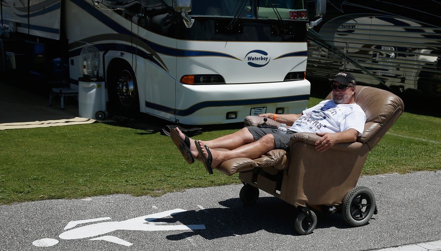 Man cruising on his motorized lounge chair Man cruising on his motorized lounge chair