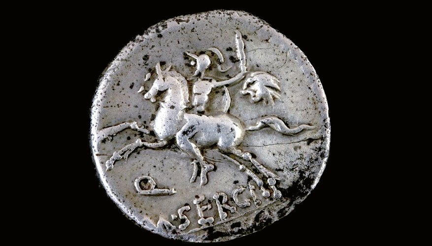 Photo Credit: Rafael Laguillo/Hemera/Getty Images Silver roman coin from 116 B.C. of Republican Demarius of M. Sergius Silus