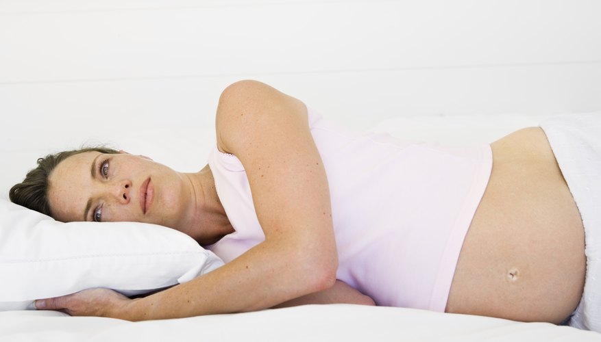 Pregnant woman laying down Pregnant woman laying down