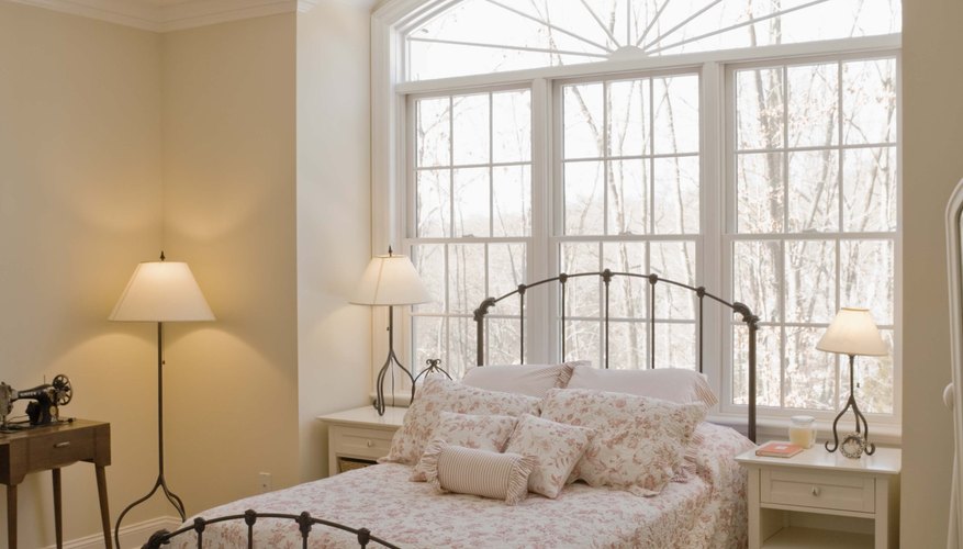 A ruffled pillow sham is perfect in a country-style bedroom. A ruffled pillow sham is perfect in a country-style bedroom.