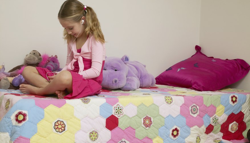 Hexagon quilts are favorites because they can be created as patchwork or arranged as flowers. Hexagon quilts are favorites because they can be created as patchwork or arranged as flowers.