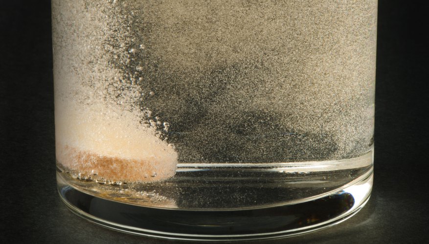 Alka Seltzer dissolving in water. Alka Seltzer dissolving in water.