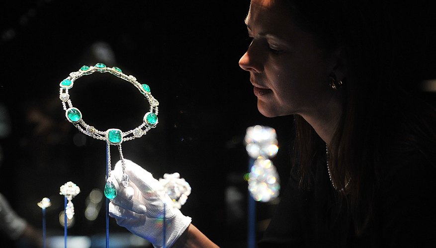 Photo Credit: Bethany Clarke/Getty Images News/Getty Images Royal emerald and diamond jewelry on display